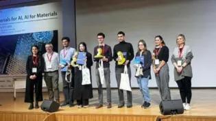 CEF students on stage receiving awards at the school of engineering postgraduate research conference
