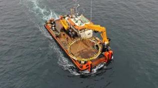 CADCP vessel out at sea carrying tidal and marine research equipment