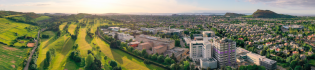 Aerial view of King's Buildings campus and the Edinburgh skyline