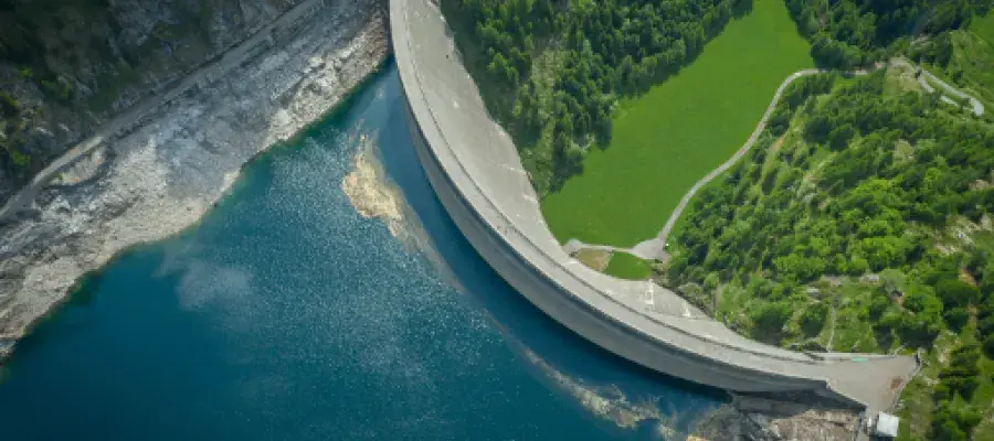 Civil and Environmental Engineering panel image showing a dam and reservoir from above