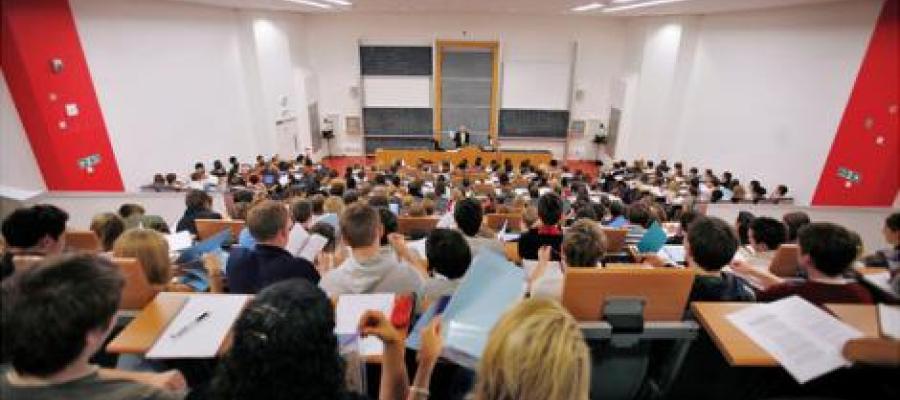 Staff and students receiving training within a lecture theatre