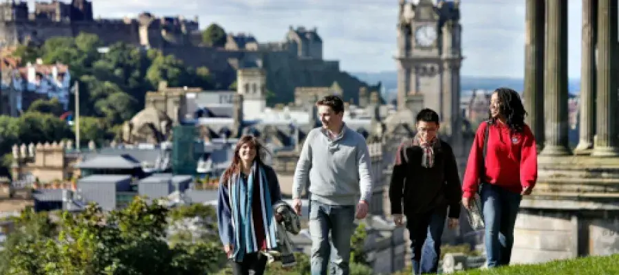 engineering masters students walking up calton hill in edinburgh