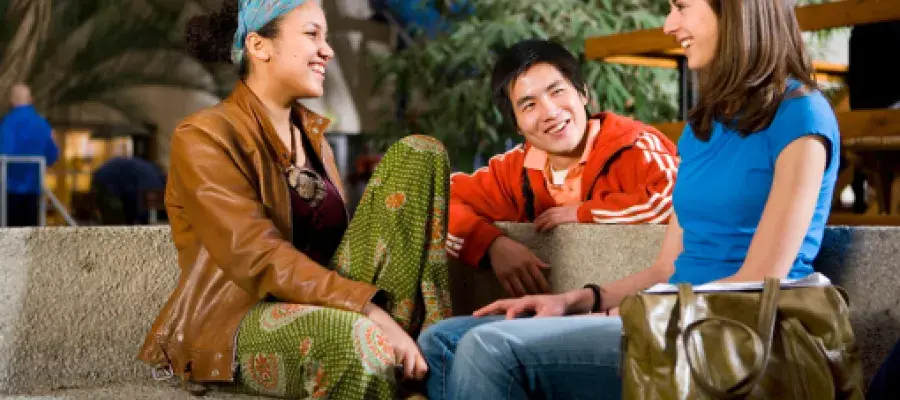 international engineering students laughing in a social setting