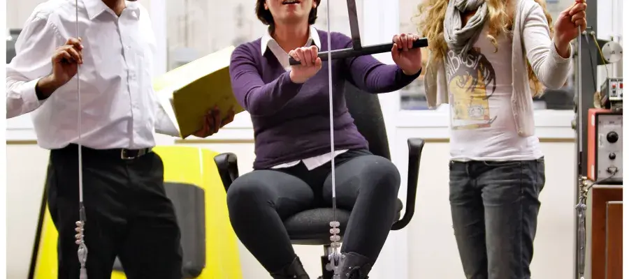 Three Engineering students in Mechanical lab
