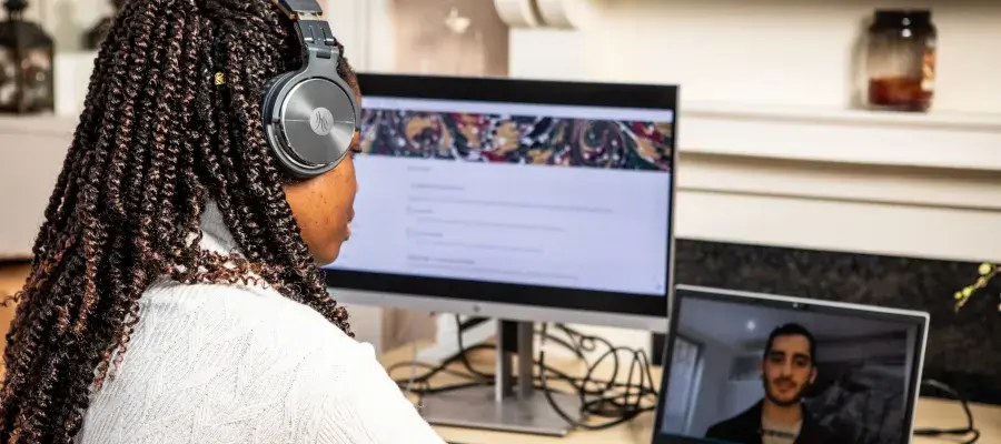 Prospective student at laptop during an interactive online talk hosted by the School of Engineering