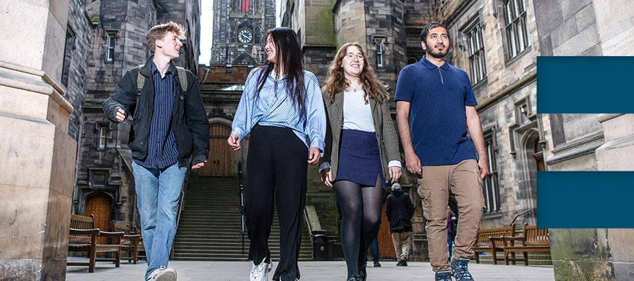 4 student walking down the stair in Old Town Edinburgh
