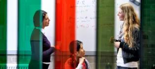 Engineering students talking in the EngInn cafe