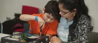 Mother and child working together