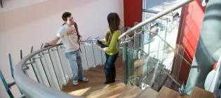 Mentoring, students on the stairs of AGB Building