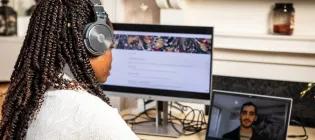 Prospective student at laptop during an interactive online talk hosted by the School of Engineering