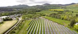 Solar array in a field near the Pentland hills, Edinburgh