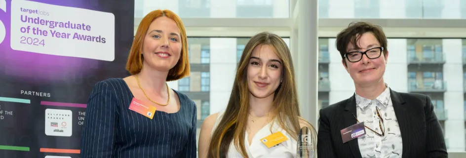 Caption: Ozlem Kesgin (centre) receives her Undergraduate of the Year Award at a ceremony in London, pictured here with Natasha Whitehurst (Rolls-Royce) and TV presenter Sue Perkins.