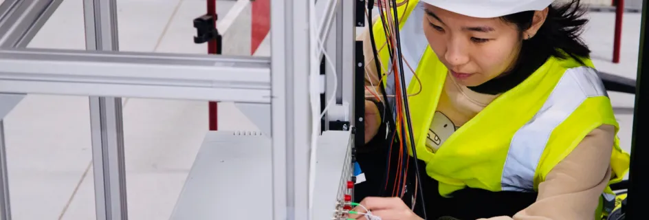 PhD student Rui Zhang conducting experimental work on an APU exhaust monitoring with laser sensors at TERC, Sheffield || PhD student awarded for advanced sensor to reduce engine emissions