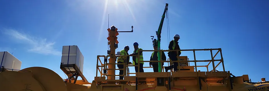 The CGEN team on Mocean Energy's BlueX wave converter. Credit Mocean Energy || Modular generator system set to transform offshore renewables 