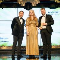 Sam Evans Net Zero Challenge winner with Nikki Flanders of SSE and Adam Kosterka from Converge