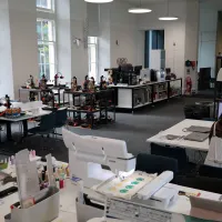 A table with sewing equipment