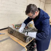 Student working on a machine