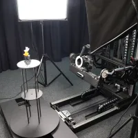 Model on turntable being 3D scanned
