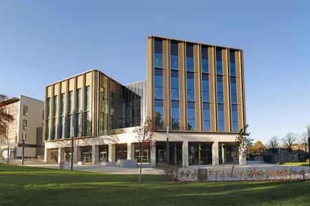 A wide angle photograph of the Nucleus Building within King's Building campus at the University of Edinburgh