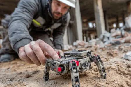 man with small robot