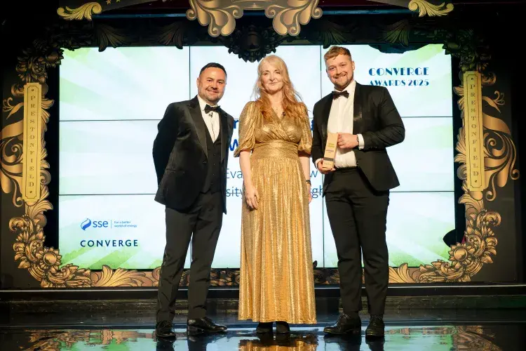 Sam Evans Net Zero Challenge winner with Nikki Flanders of SSE and Adam Kosterka from Converge
