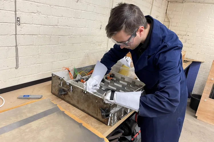 Student working on a machine