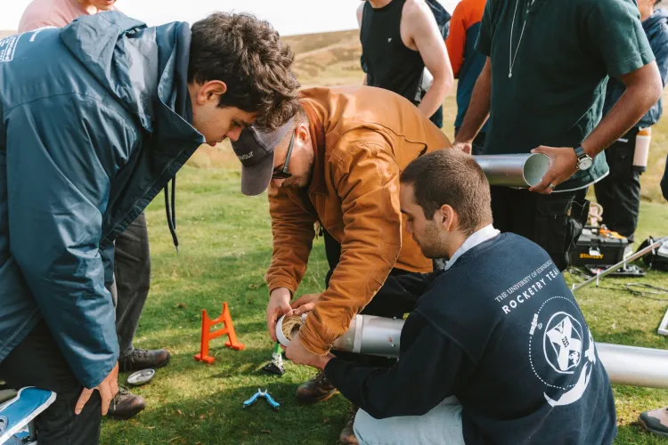 Team working on rocket.