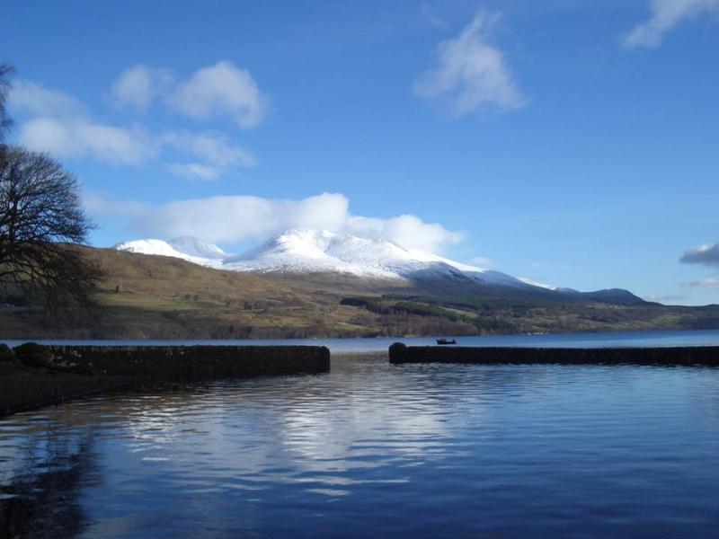 Loch Tay with a snowy Ben Lawers and blue sky in the background