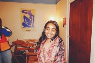 Student smiling at the camera