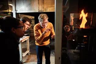 Professor Rory Hadden demonstrating a fire experiment.