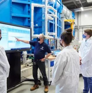 Swansea University's Wind Tunnel with staff and students watching on