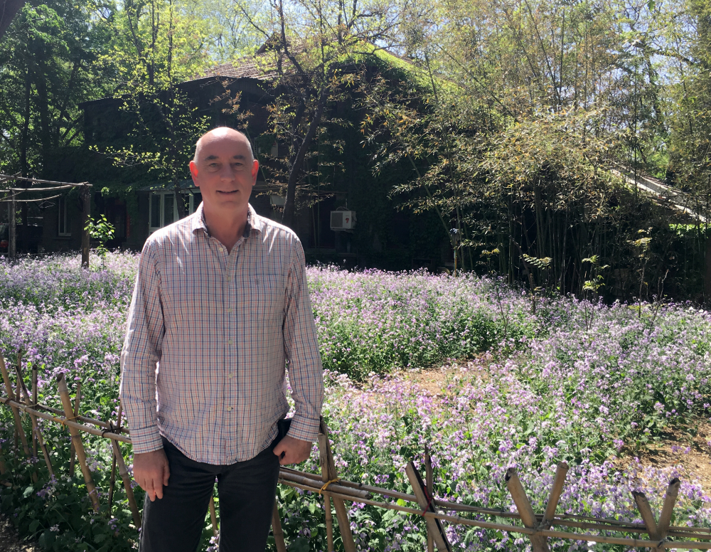Professor Alistair Borthwick in the garden of Peking University