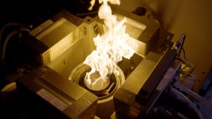 photo of fire taken from above an experiment in a scientific laboratory