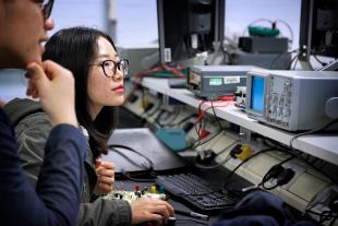 Engineering students in an Electrical and Electronics Engineering Laboratory