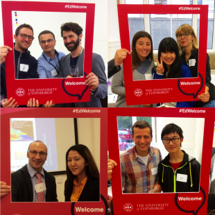 Academic staff and postgraduate students posing for pictures with University of Edinburgh #edwelcome red picture frame