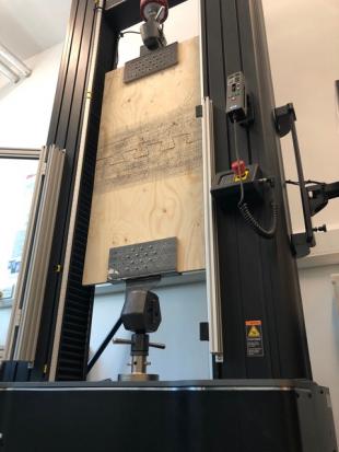 photograp of a timber joint test using electro-mechanical extra-height Universal Test Machine UTM