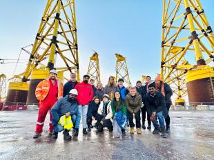 IDCORE students with Seagreen offshore wind turbine jackets in the background